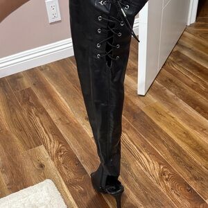 Sleek Black Lace-Up Heeled Boots